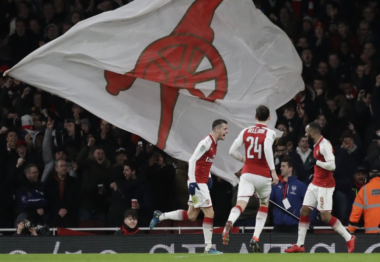 Taruhan sepak bola bersemangat, saat Arsenal berhasil mengejar ketertinggalan untuk mengamankan tempat di Wembley