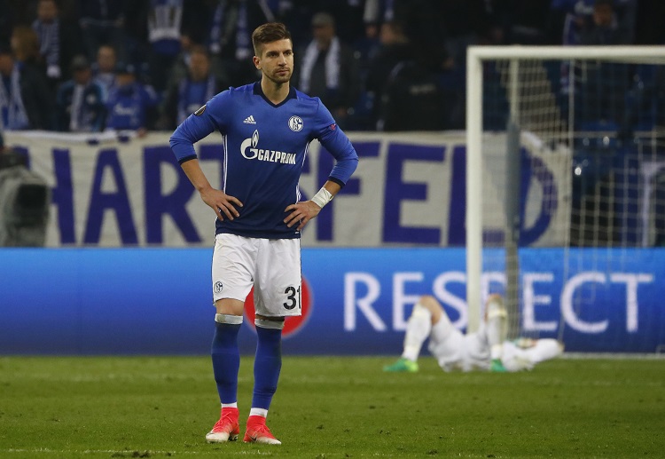 Matija Nastasic receives a straight red in their Bundesliga game against Wolfsburg