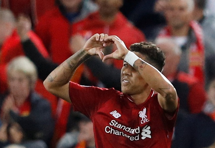 Roberto Firmino mencetak gol kemenangan Liverpool saat menghadapi PSG.