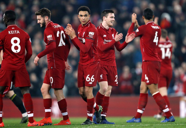 Trent Alexander-Arnold celebrates after playing a vital role in Liverpool’s Premier League match